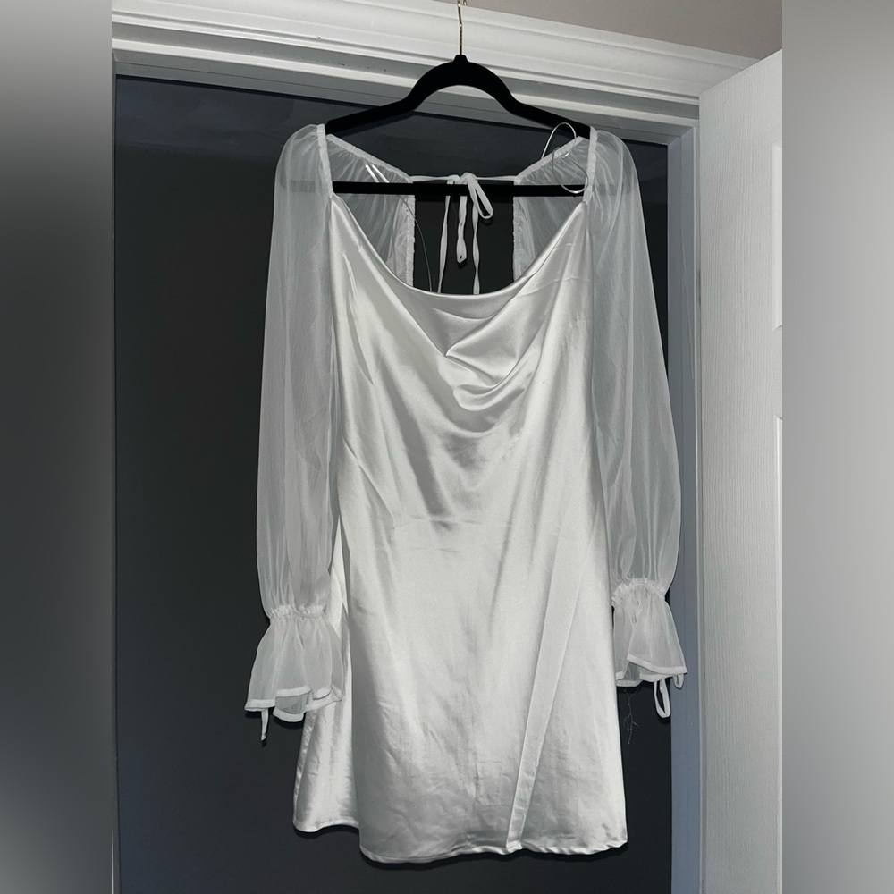 White satin dress. Perfect for brides.
